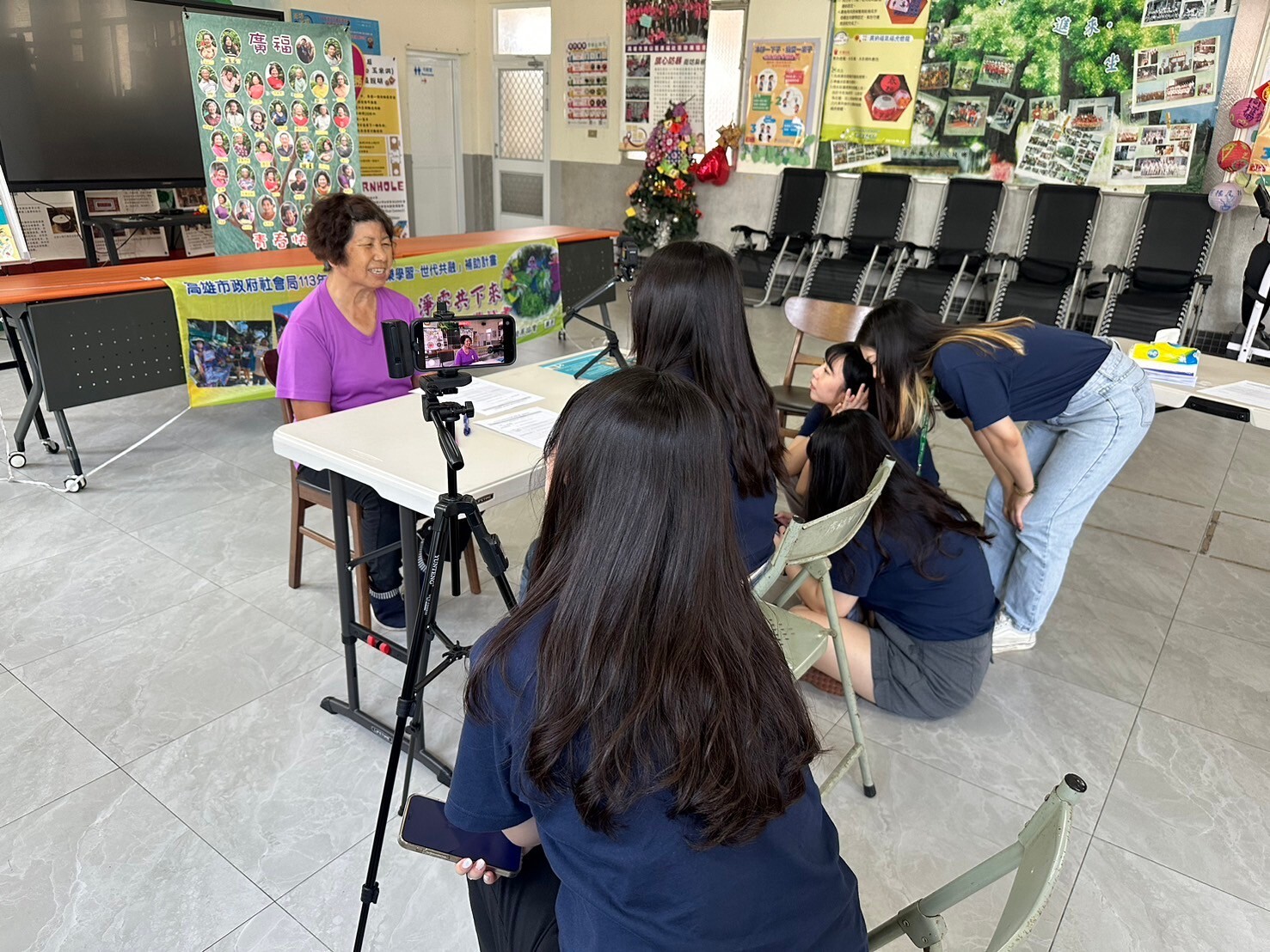 Institute of Public Affairs Management students interviewing local elders as part of the course