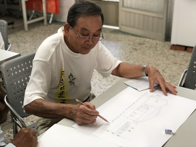 時任旗山鎮公所建設課課長協助畫出車站周邊意象圖片