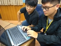 Students studying and discussing with one anotherImage