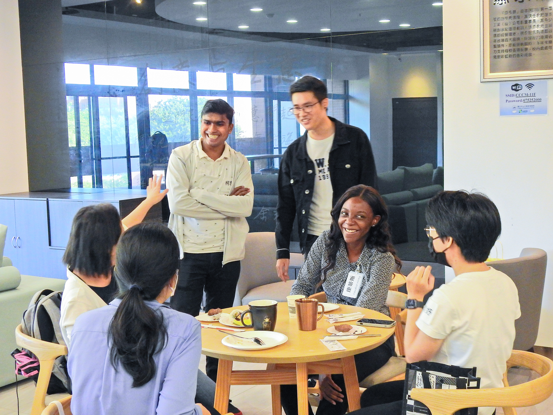 Professors and doctoral students interact