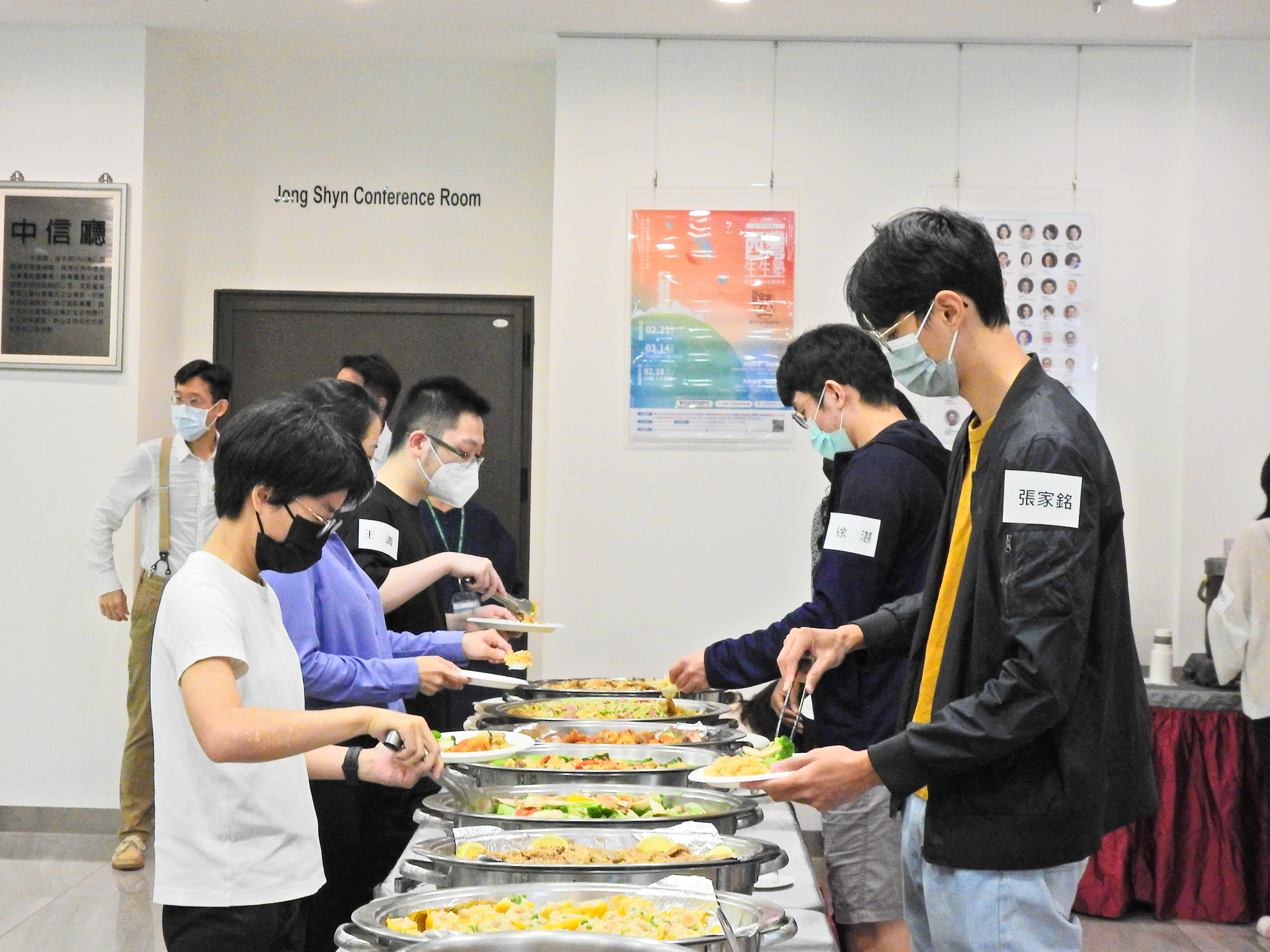 Teachers and students enjoy a delicious meal