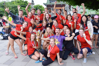 From time to time, students participate in extracurricular activities. Here, IBMBA and GHRM MBA students and international exchange students show off the medals they won dragon boat racing.