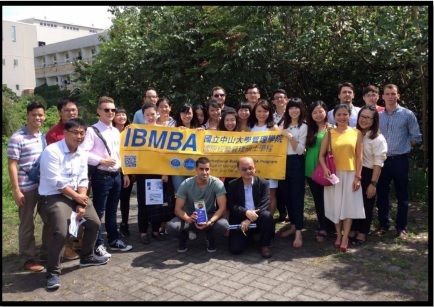 IBMBA students taking a picture with Elan and Professor Sung at the production factory in Tainan.Image