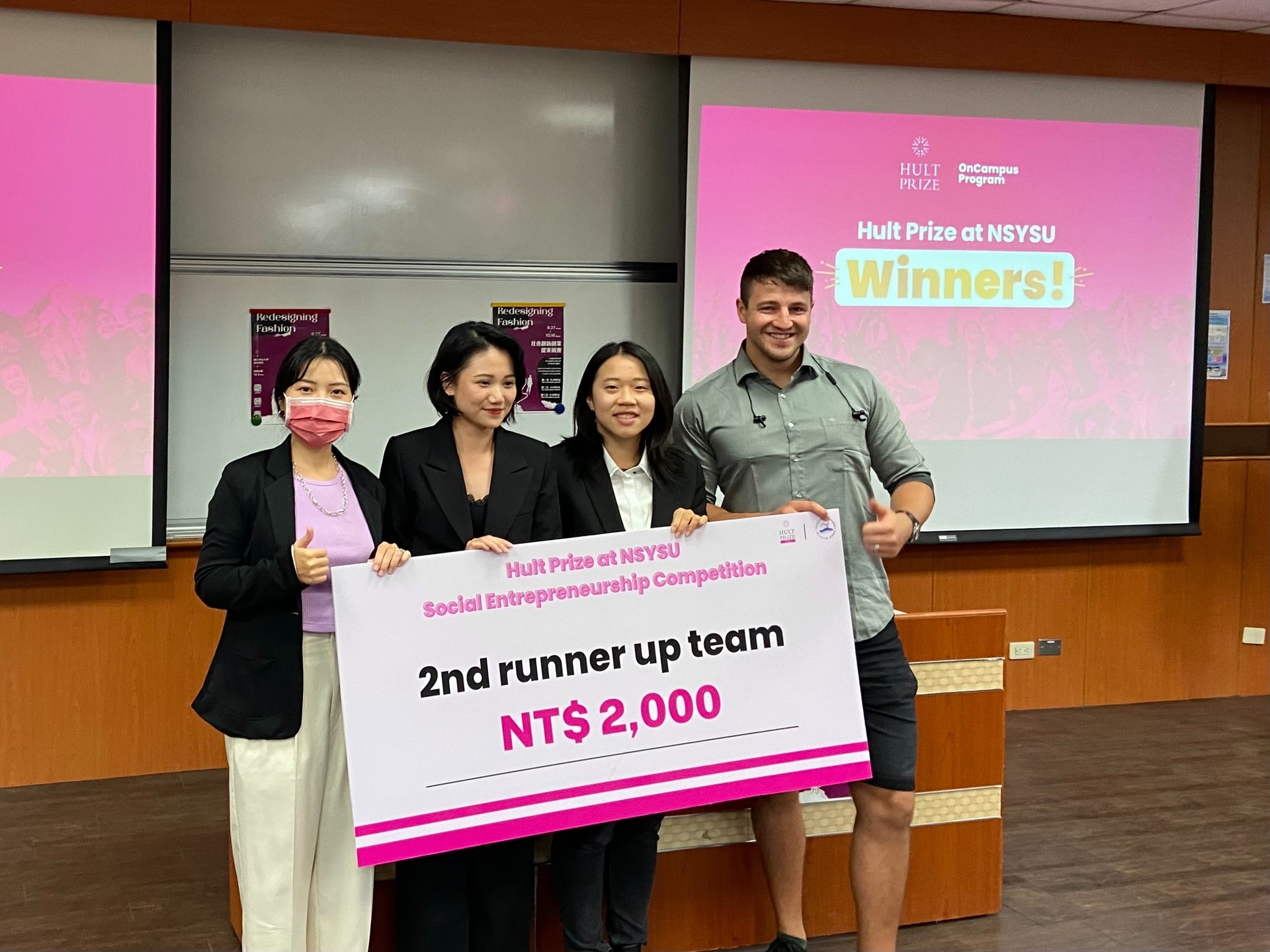 Judge, Ms. Lin, awarded the second runner-up team “SUITable”Image