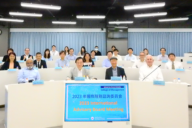 A group photo of the International Advisory Board Members and College of Management faculty present at the meeting