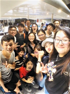 Participating in guided activities with students as teachers and friends, teaching and having funImage