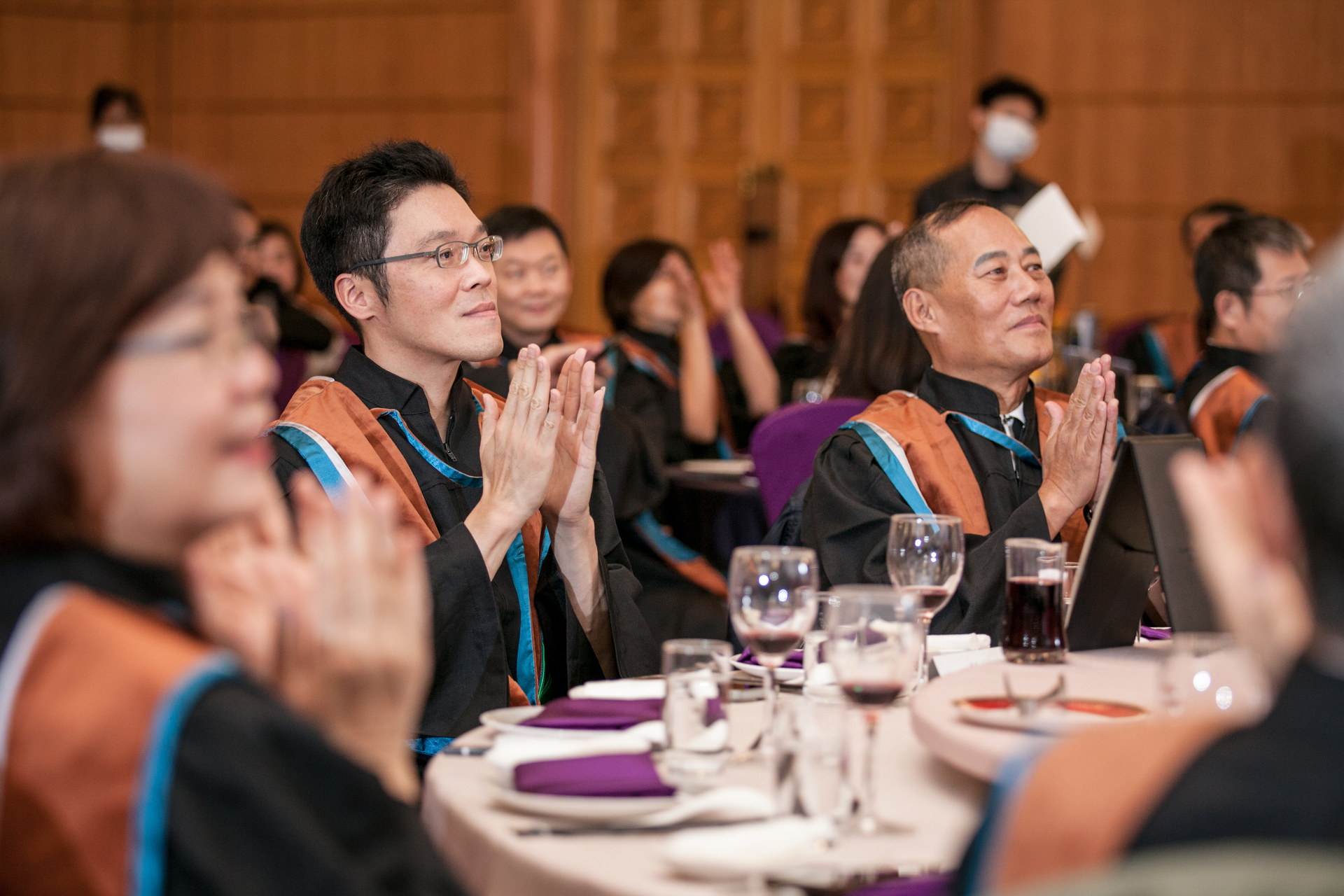 Students and teachers gather at the graduation ceremonyImage